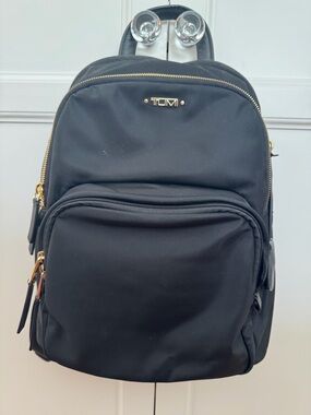 Tumi Black Backpack with Gold-Tone Zippers